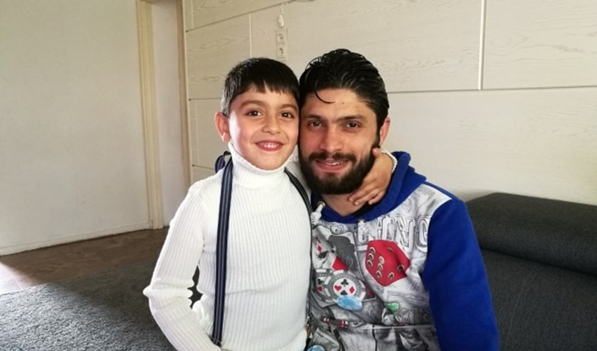 Vader Jamal en zoon Saïd zijn blij dat ze de ontberingen van de oorlog in Syrië achter zich hebben kunnen laten. (Foto: Mirjam Collens)