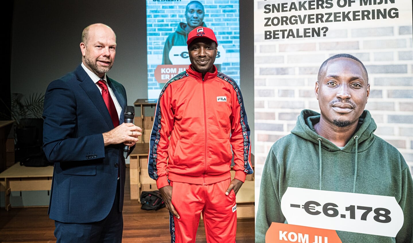 Michiel Grauss bij de aftrap van de start van de campagne ‘Kom uit je schuld' in het najaar van 2019. Met ervaringsdeskundige Donovan. Foto: René Castelijn