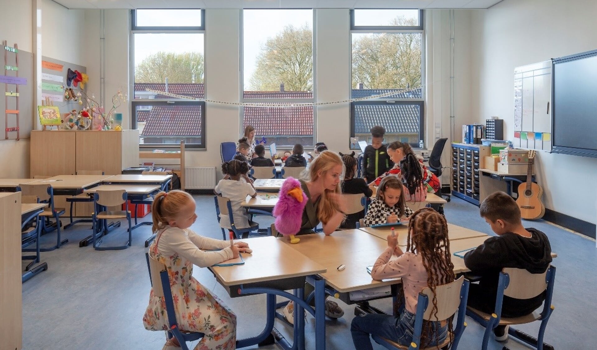 Kinderen en leerkrachten van de Pniëlschool in Vreewijk hebben weer een fijn en inspirerend schoolgebouw. Foto: pr