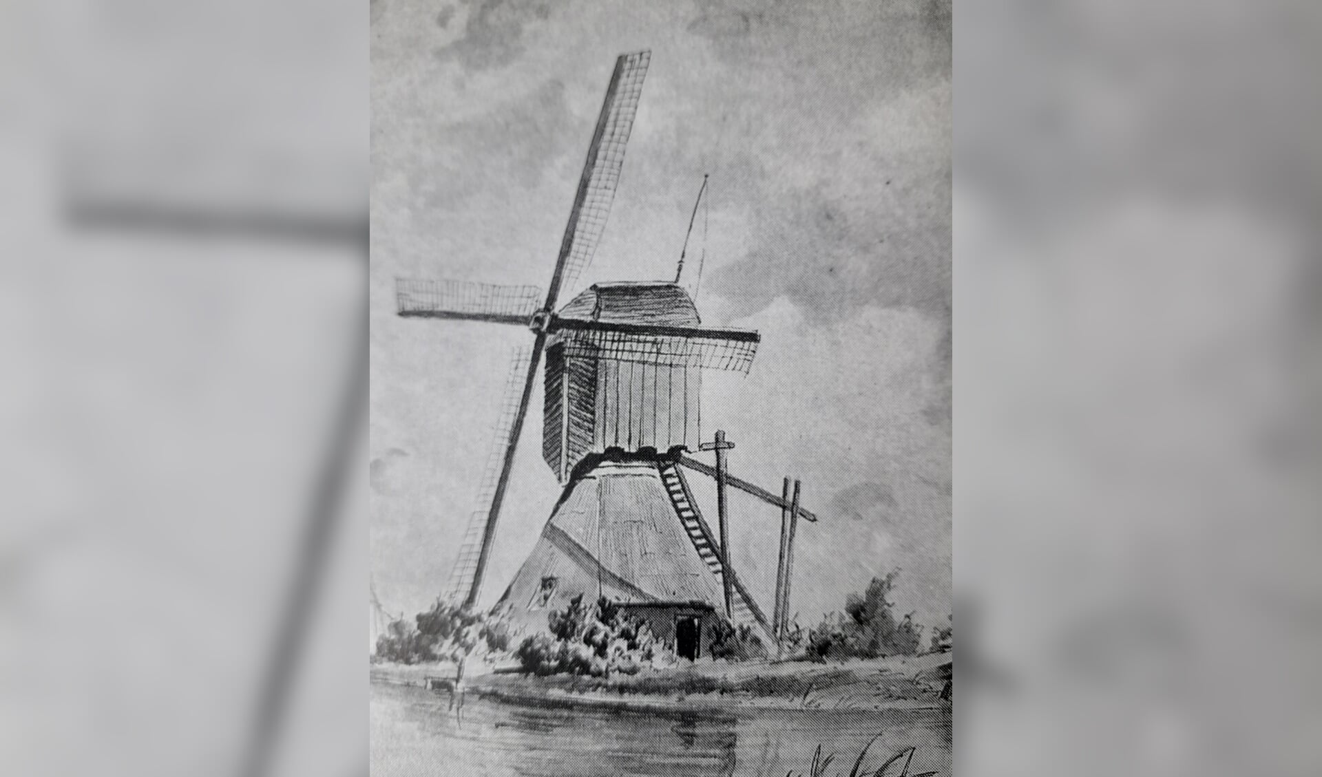 Waterwipmolen, foto van de soort molen die ooit langs de Rotte stond en nu via het doorkijkpaneel tot leven wordt gebracht.