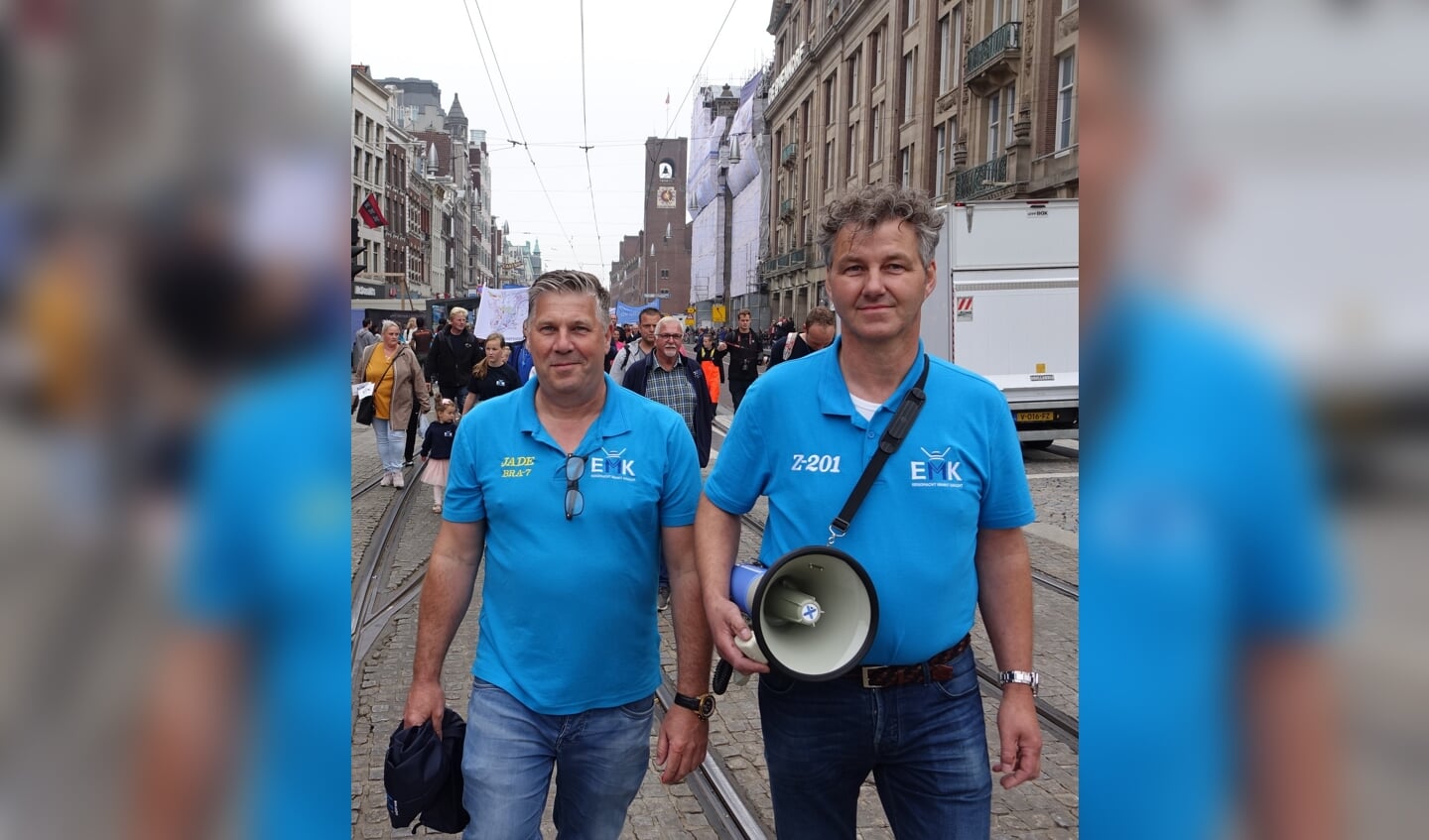 H Job Schot en Dirk Kraak vooraan tijdens de mooie EMK-actie in Amsterdam twee jaar geleden.