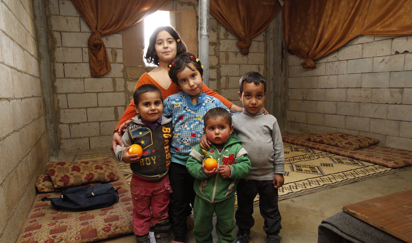 Fotograaf Arie Kievit fotografeerde vluchtelingen in Syrië en in de opvang in Bussum. | Foto: Arie Kievit 