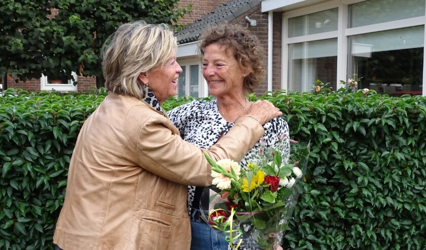 <p>Buren werden verrast door een bloemetje van... de buren. </p>