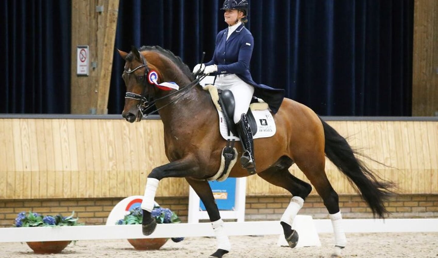 Lotje Schoots met Justin op de Indoorkampioenschappen