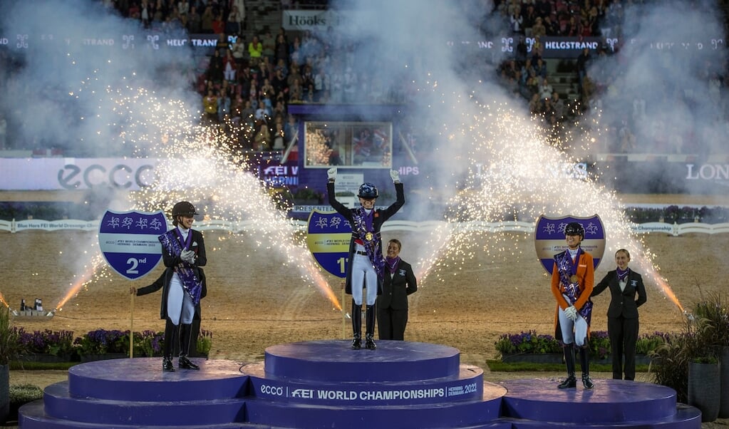 Podium Grand Prix Freestyle 1. Charlotte Fry - Glamourdale, 2. Catherine Laudrup Dufour - Vamos Amigos, 3. Dinja van Liere (NED) - Hermes
ECCO FEI World Championships - Herning - Denmark 2022
© DigiShots