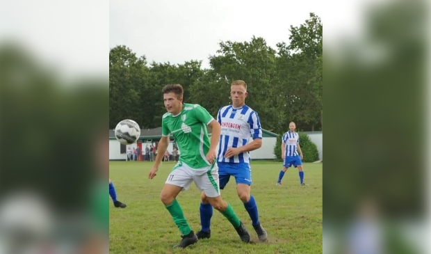 Colin in het groene shirt van WIK '57