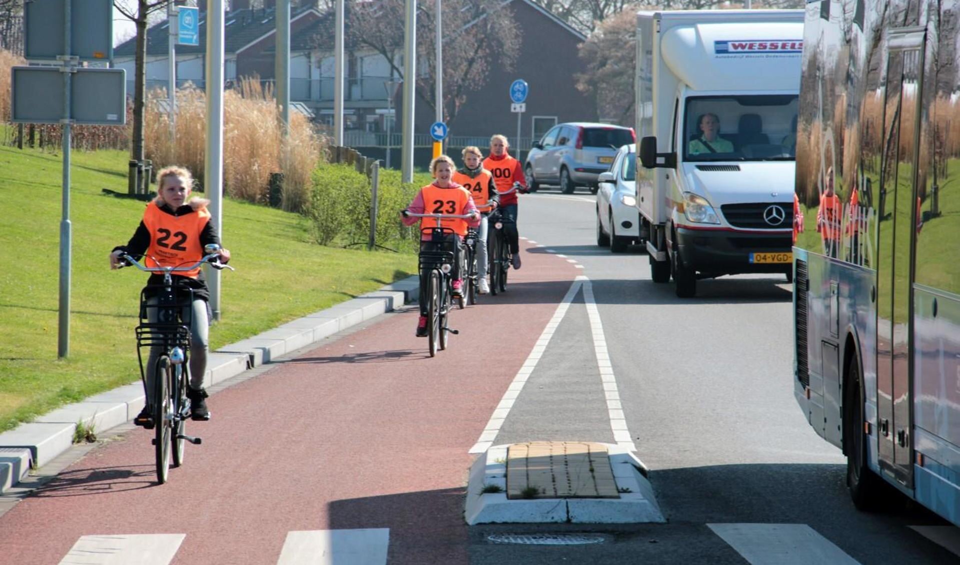 Het verkeersexamen is het enige moment dat je wel weet wat een fietser gaat doen.