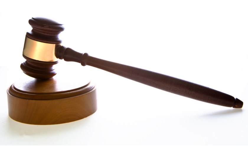 Law gavel on white.