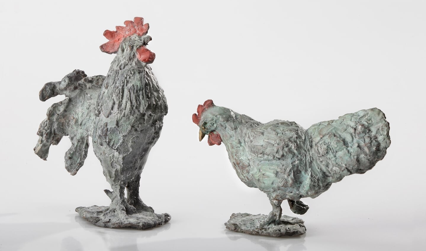 Arno Goossens: haan en hen (brons) in Galerie Posthuys