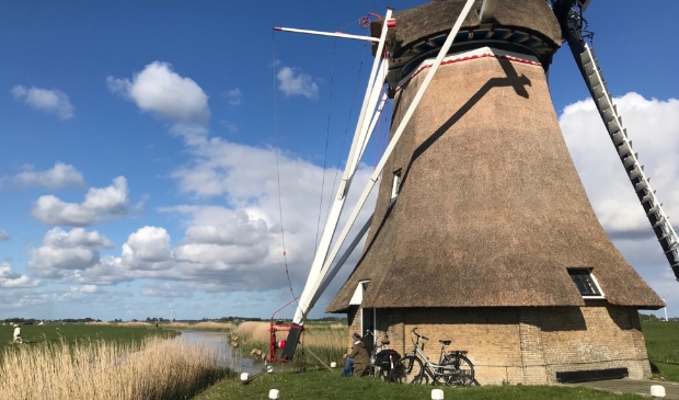 Picknicken bij de molen tijdens de winkeltjesroute.