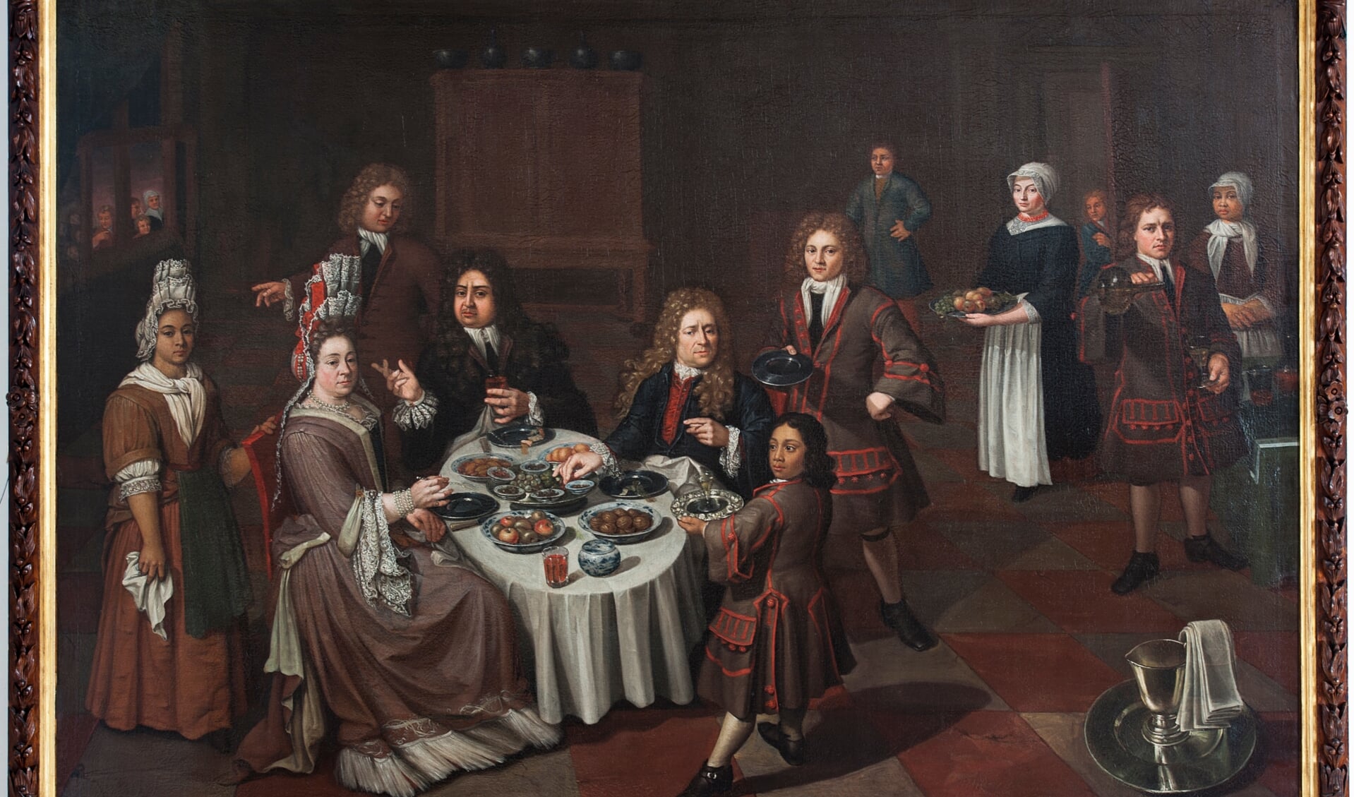 Het schilderij “Maaltijd met Julius Schelto van Aitzema, Sara van der Broek, gasten en bedienden"