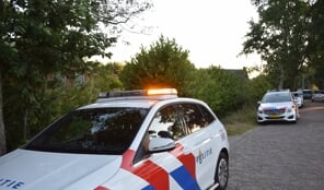 Persoon te water aan de Krúswei