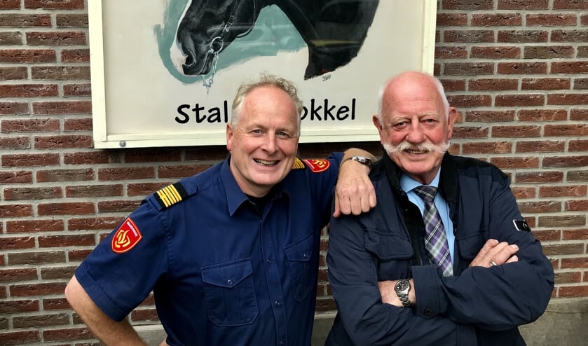 Zoon Erwin naast vader Te Bokkel.