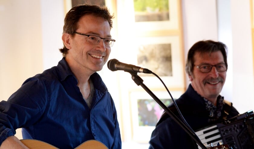 <p>Paul Mulder en Theo Scholten. (foto: Arjen Bernard)</p>