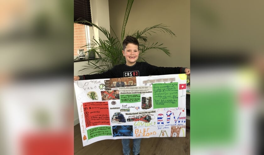 Lukas (7 jaar) met zijn moodboard. (foto: Femke Gebbing)