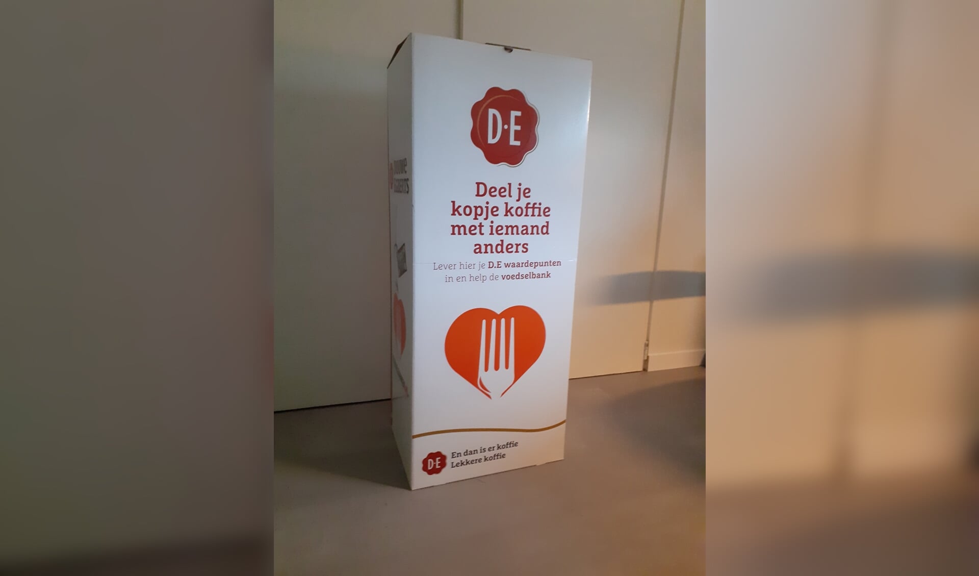 Verzamelbox DE-punten in de winkel. 